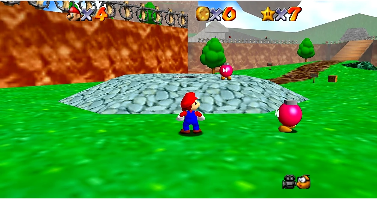Mario standing near pink Bob-omb Buddies in Bob-omb Battlefield, Super Mario 64
